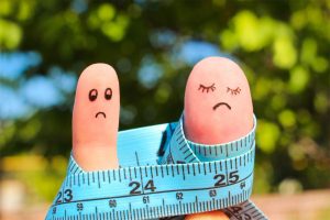 Cum pesimismul poate contribui la pierderea în greutate